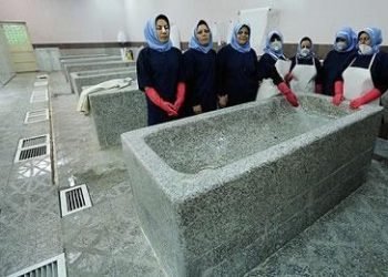 Women workers in a mortuary protested court order