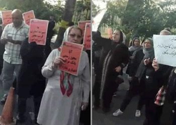 Women demonstrate in Tehran protesting the looting of property